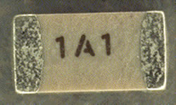 Ceramic chip capacitor marking, very small character sizes, high throughput, good contrast on most ceramics. Excimer marking is normally integrated into an automated test handler. Image for excimer-ceramic-chip-capacitor-markjpg