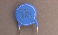 Epoxy coated capacitors develop high contrast marks when marked with the LaserMark laser. Image for blue-capacitor-laser-markedjpg