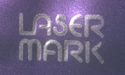 This polyethylene sample uses Aflair 219 and produces a light mark on a dark background Image for laser-mark-afflair-219-purple-in-polyethylenejpg