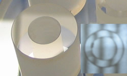 This 1/2" air-spaced etalon spacer is shown along side an interferometric view of the same spacer. The spacers need to be made to etalon tolerances since the spacer determines the separation and tilt between the two end plates. Image for etalon-spacerjpg