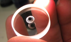 This unusual looking item is an optically contacted stepped phase mask. We called it "the layer cake". Image for optically-contacted-phase-maskjpg