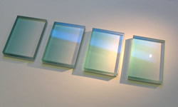 These gradient filters increase in optical density from right to left (clear on one side, green on the other) Image for gradient-filter-glass-attenuatorsjpg