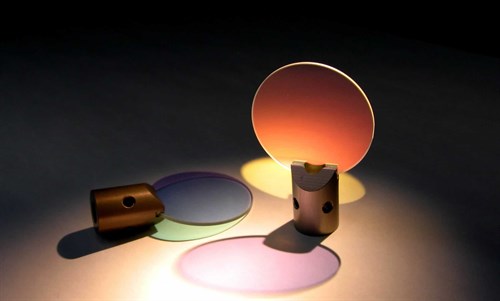 Galvanometer scanner mirrors coated for 1.064nm YAG laser wavelength, showing nice colors in the visible at different angles Image for coated-galvo-mirrors-flippedjpg